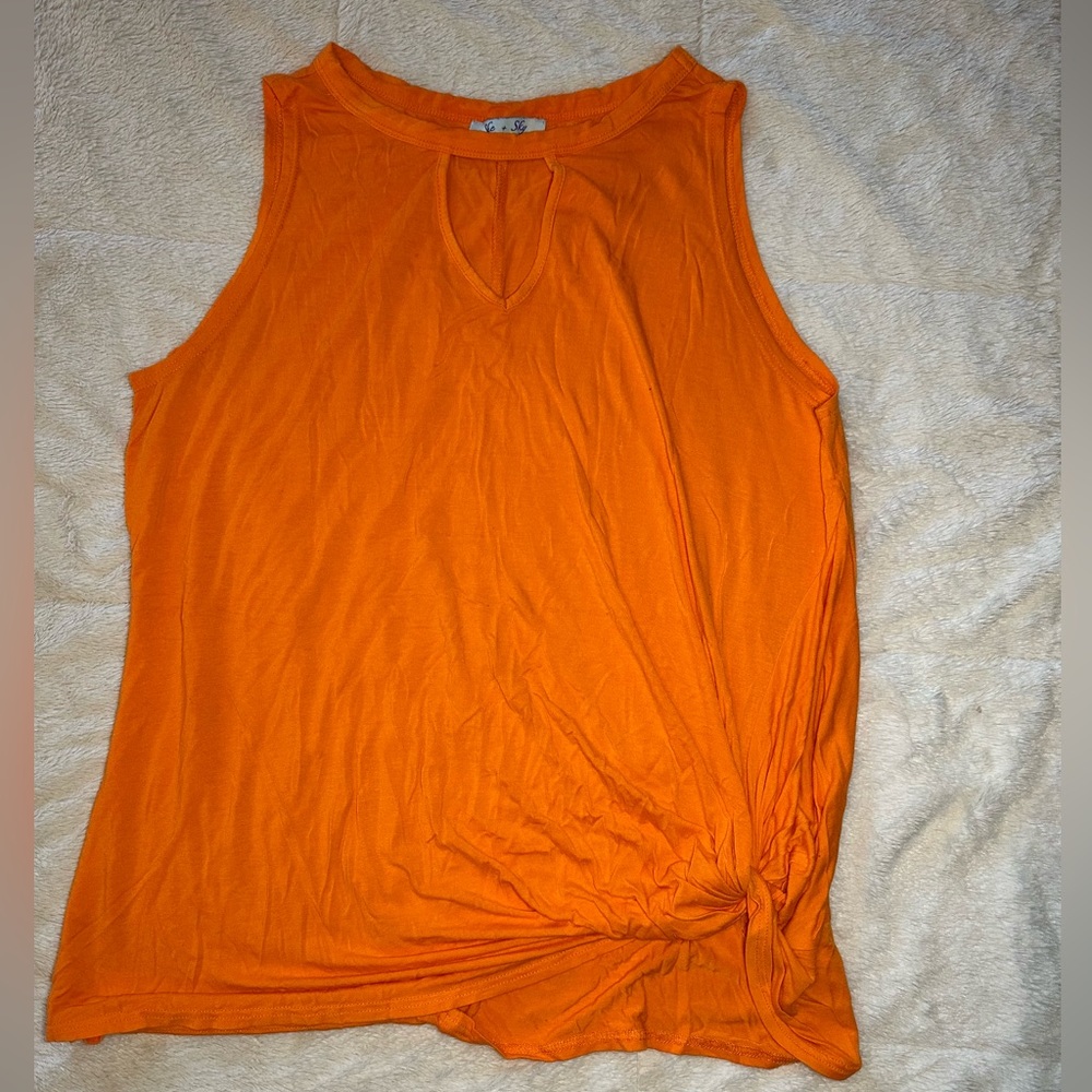 Boutique top size L cutout and twist waist details